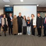 14. Family representatives of both inductees with Principal Mark Robertson, Board Chairman Chris Damatopoulos and Board Treasurer Sam Vassos